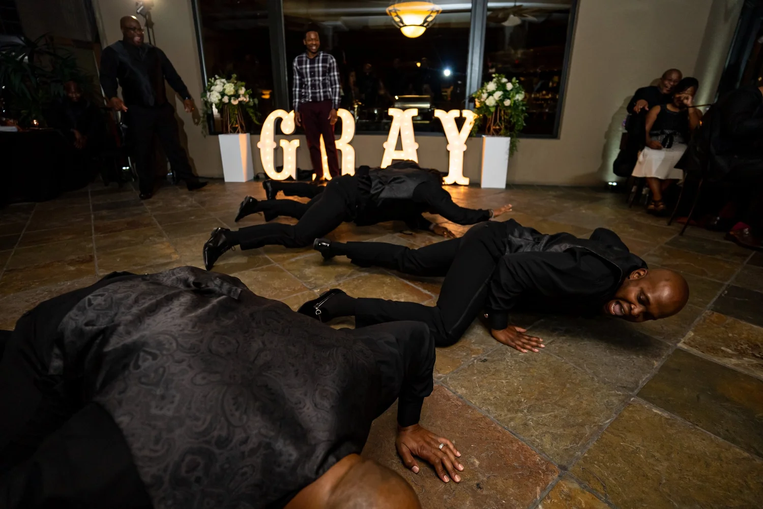 Las Vegas wedding photography — groomsmen dancing on the reception floor