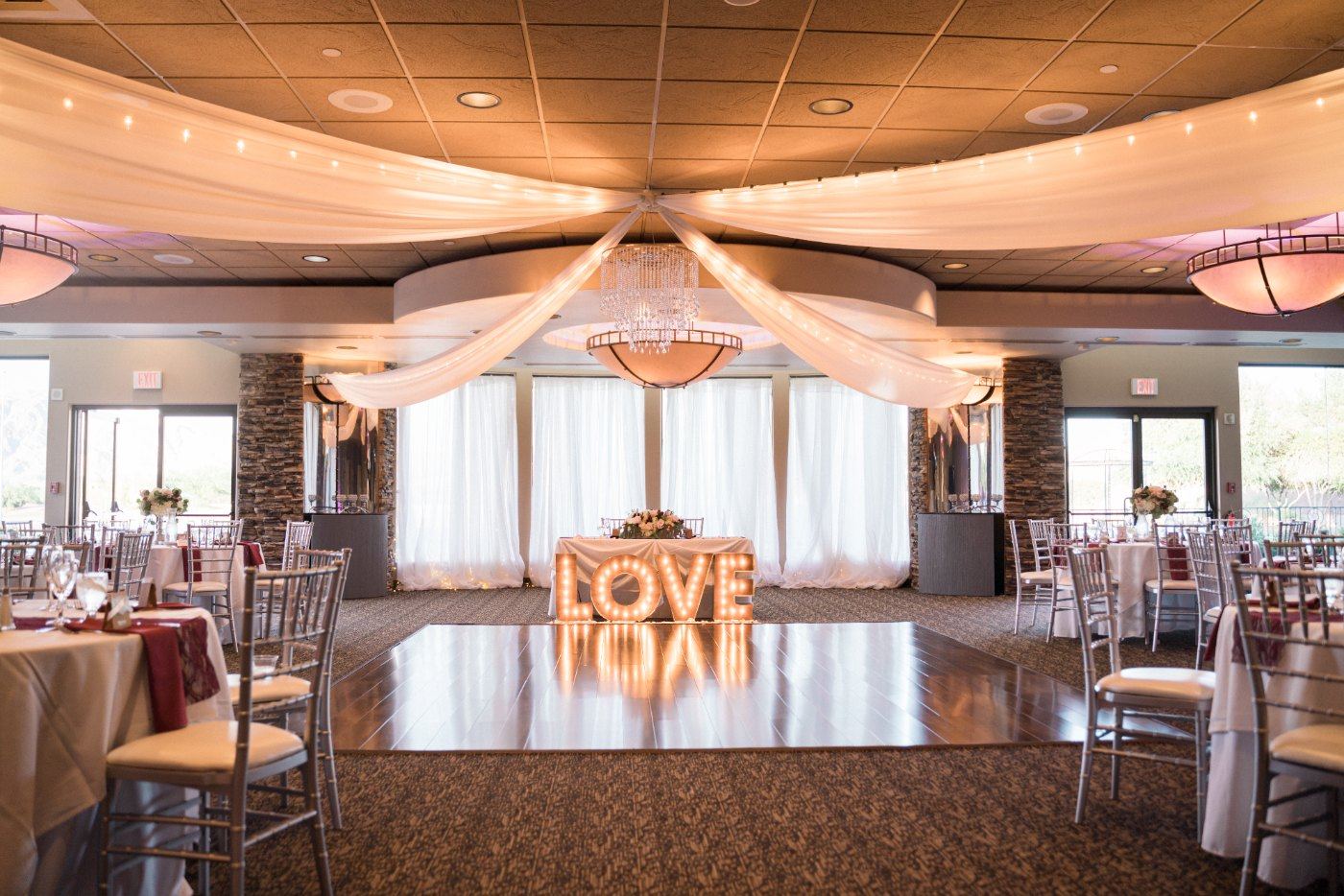 Las Vegas wedding photography — the ballroom set and empty with lit LOVE letters