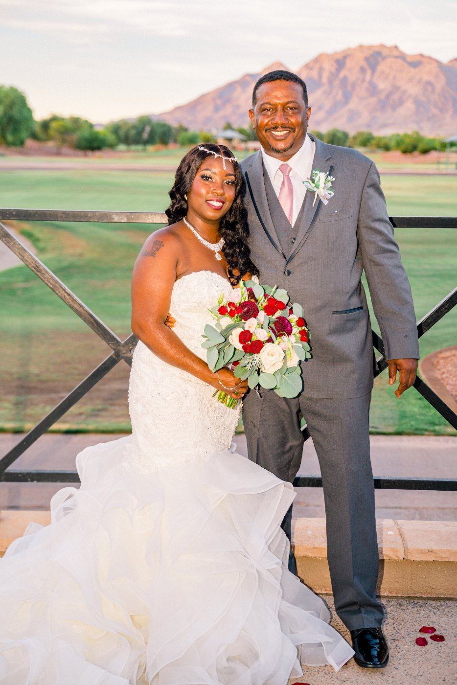 Las Vegas wedding photography — a portrait of the couple with the mountains behind them