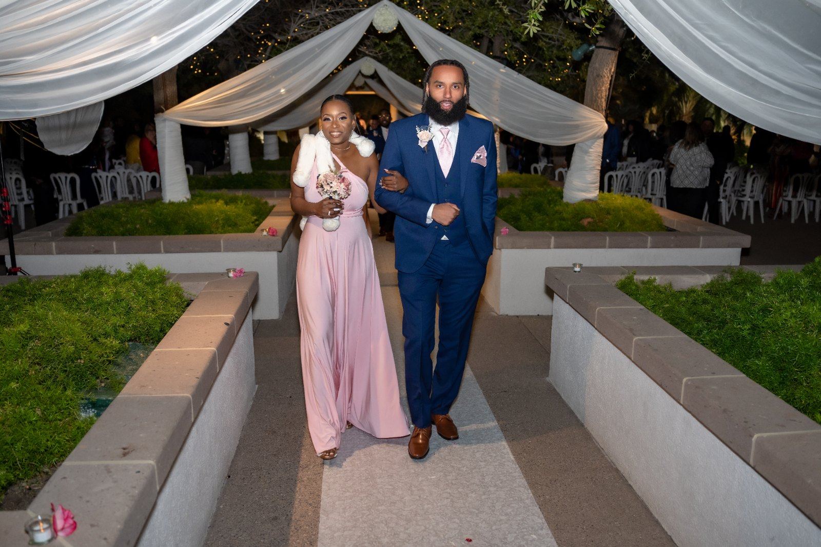 Las Vegas wedding photography — the recessional through the draped garden aisle