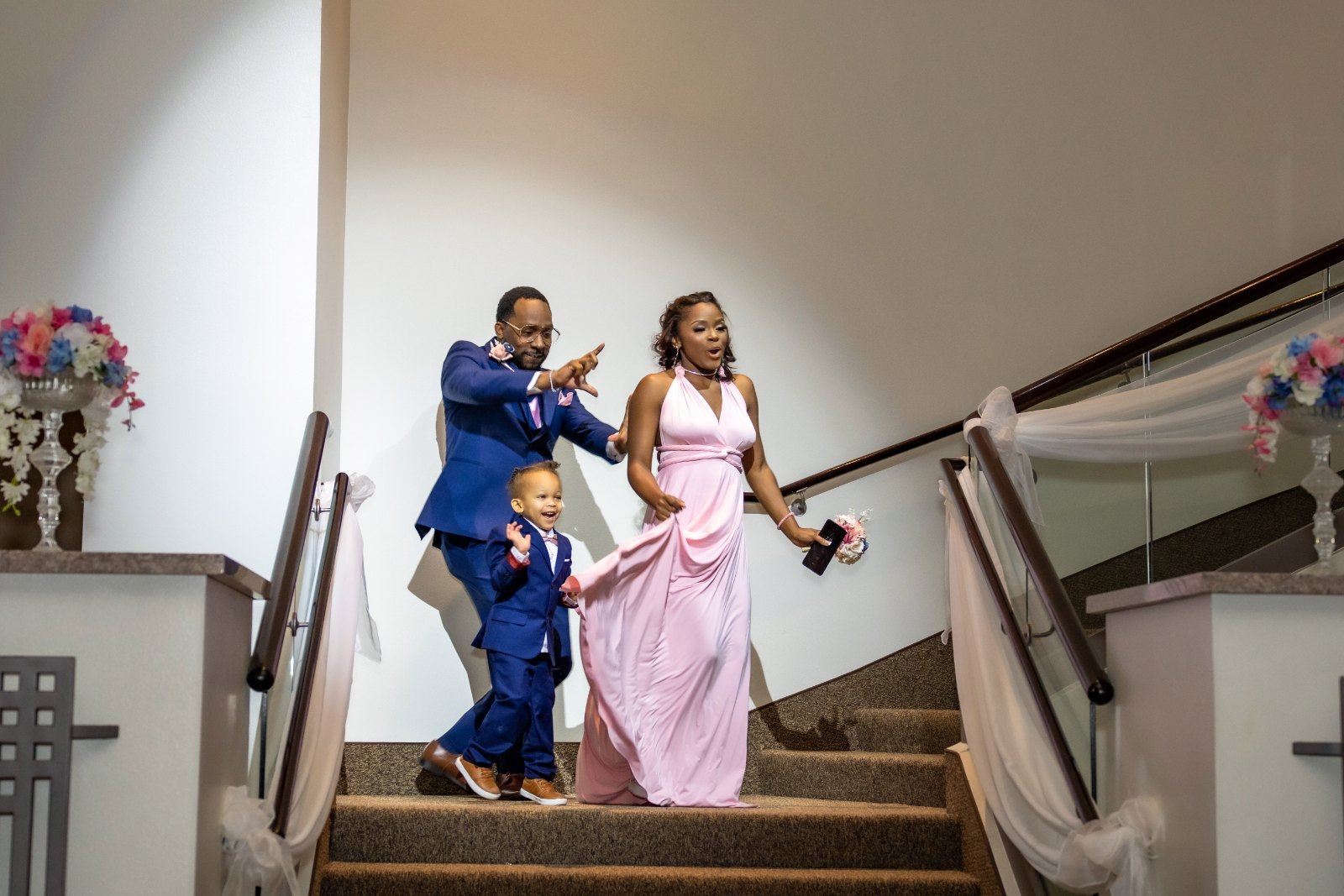 Las Vegas wedding photography — the wedding party laughing together on the staircase