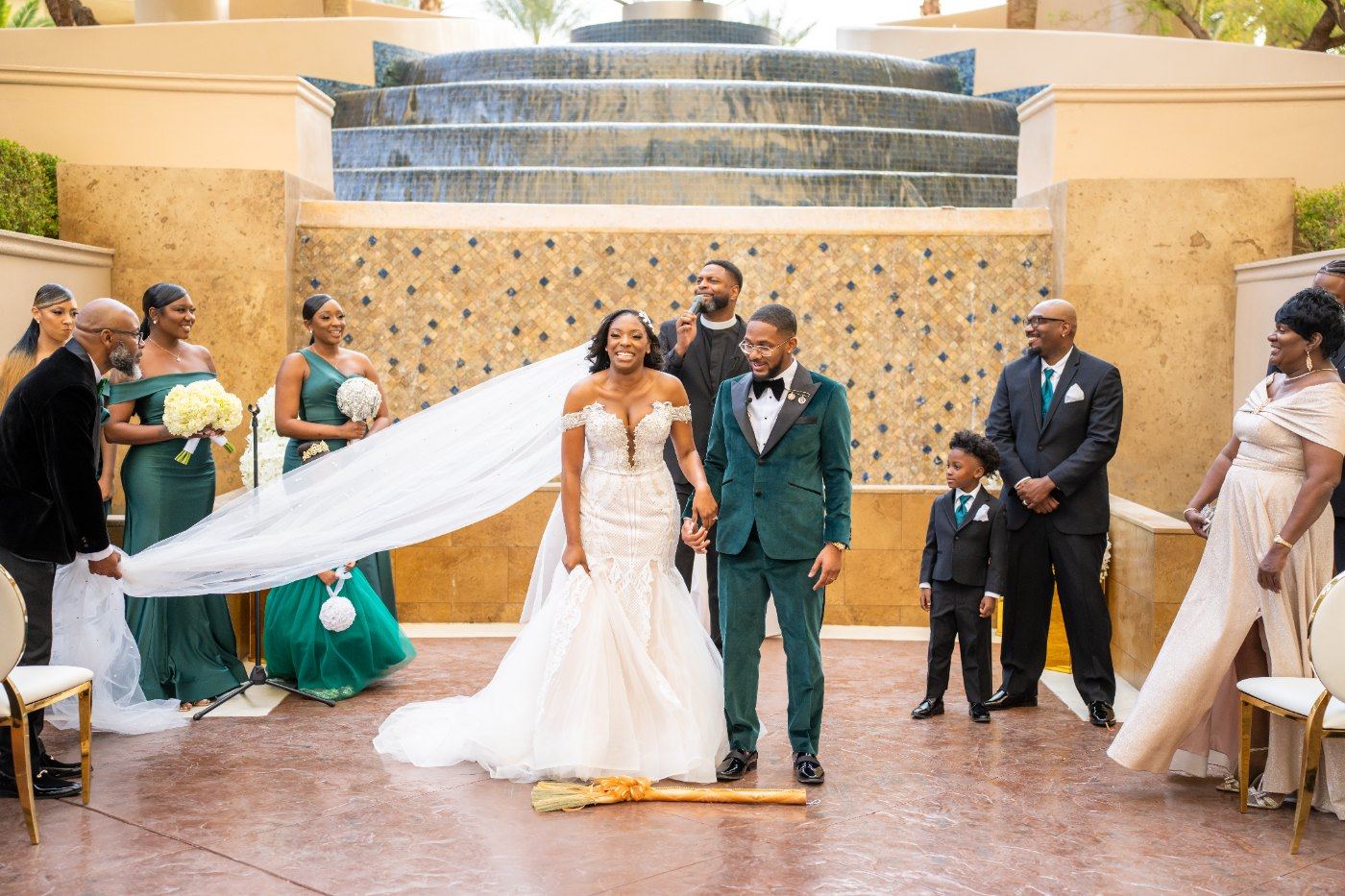 Las Vegas wedding photography — the couple at the altar with the veil spread out behind