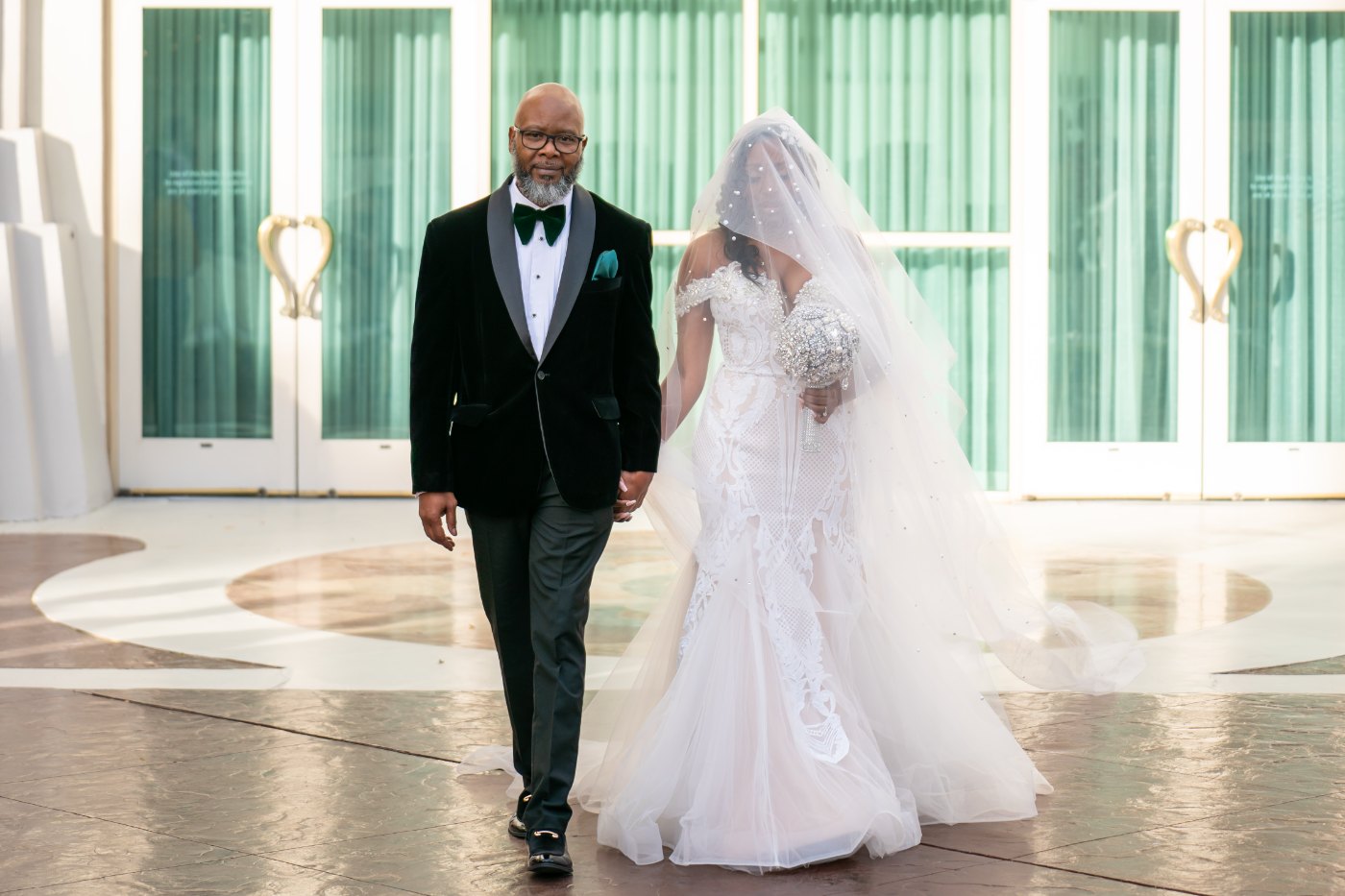 Las Vegas wedding photography — the bride walking in with her father