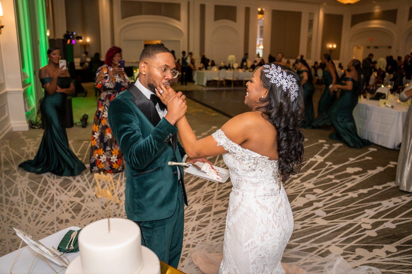Las Vegas wedding photography — feeding each other cake and laughing