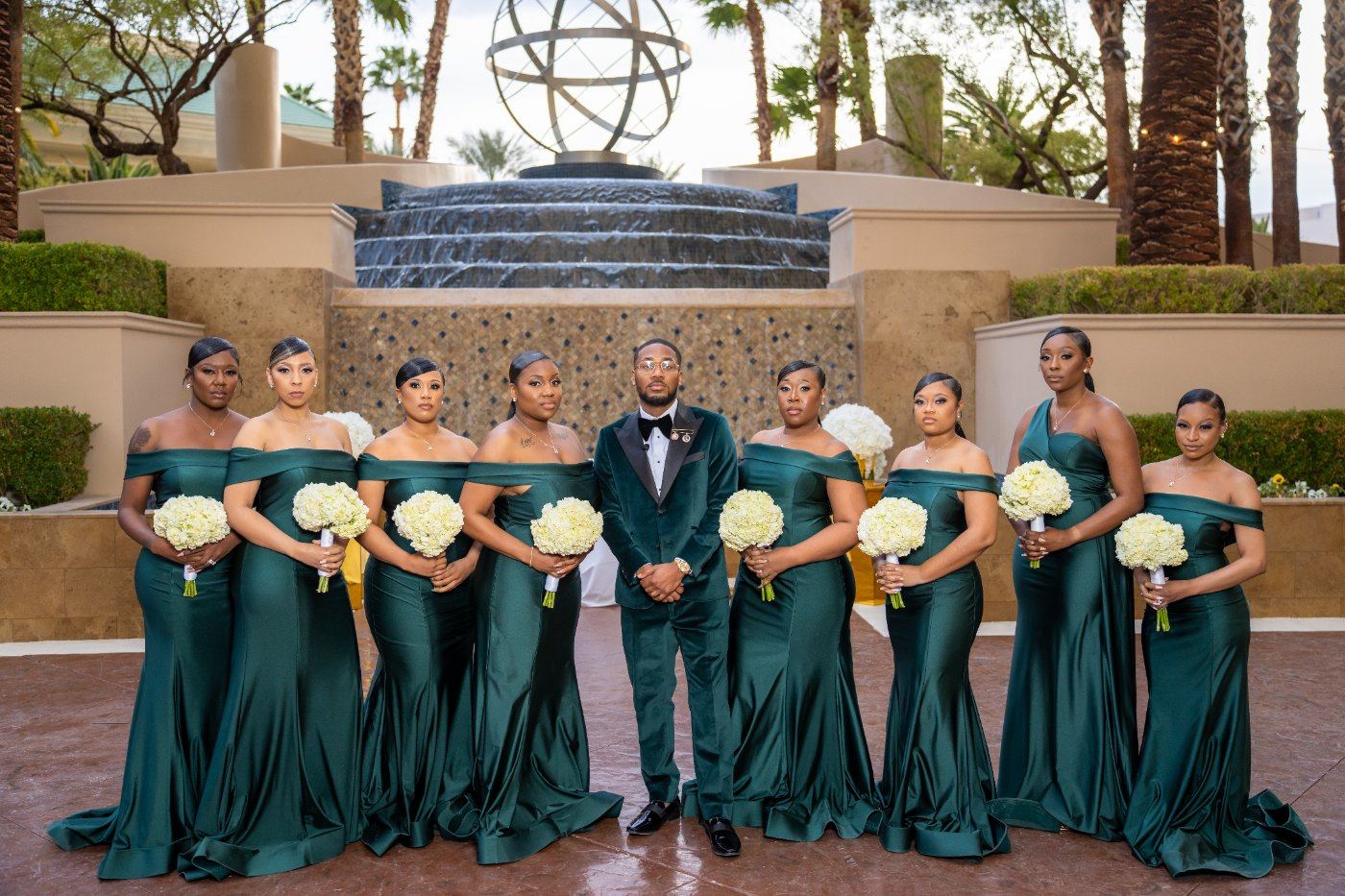 Las Vegas wedding photography — the groomsmen and bridesmaids together by the waterfall