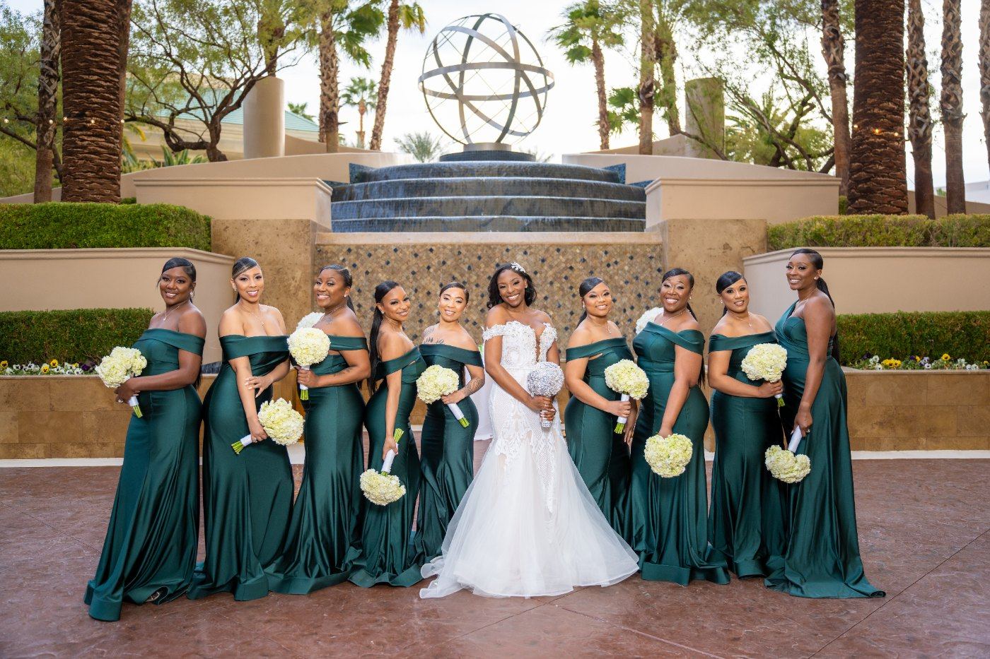 Las Vegas wedding photography — the bride with her bridesmaids in emerald
