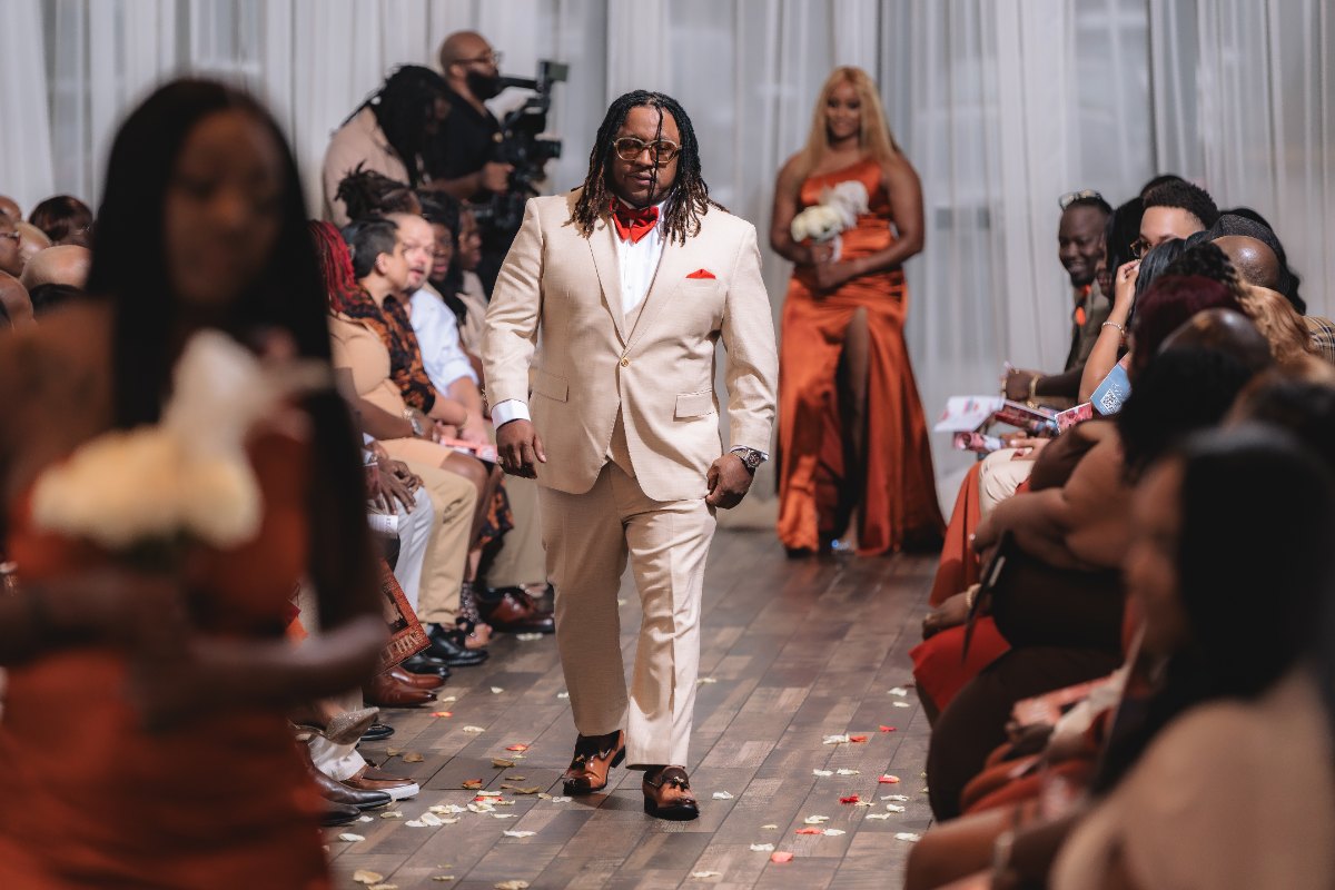 Las Vegas wedding photography — a groomsman walking in past the guests