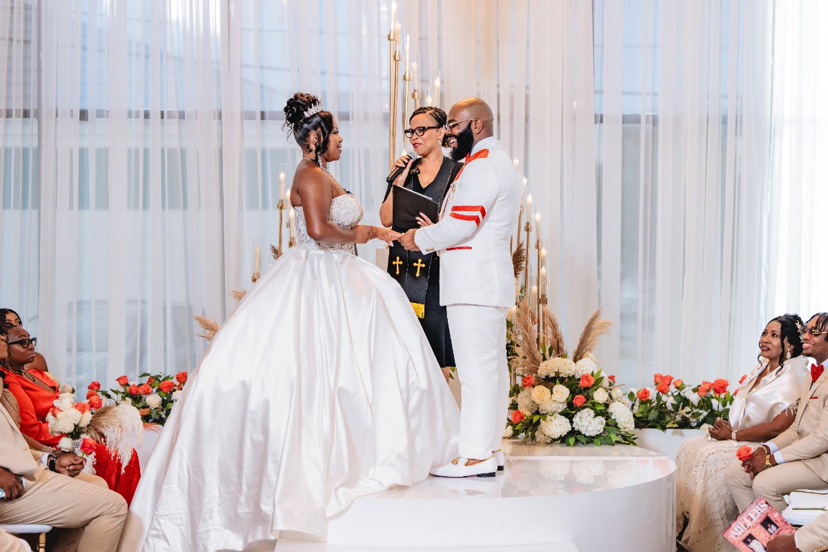 Las Vegas wedding photography — the couple at the altar on the white platform