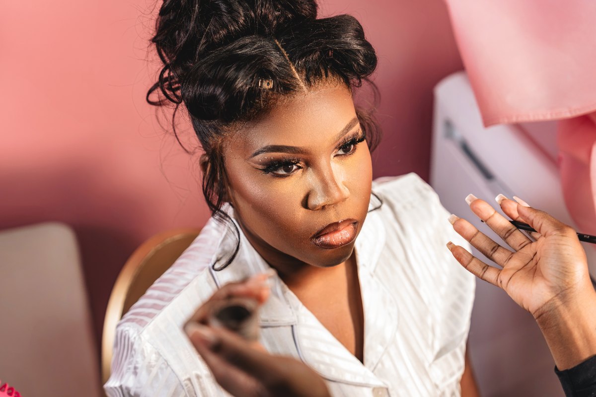 Las Vegas wedding photography — the bride in the makeup chair having her look finished