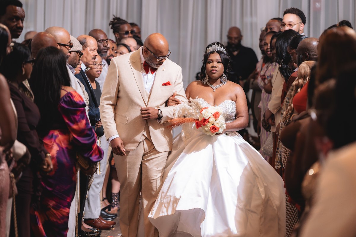 Las Vegas wedding photography — the bride walking in with her father