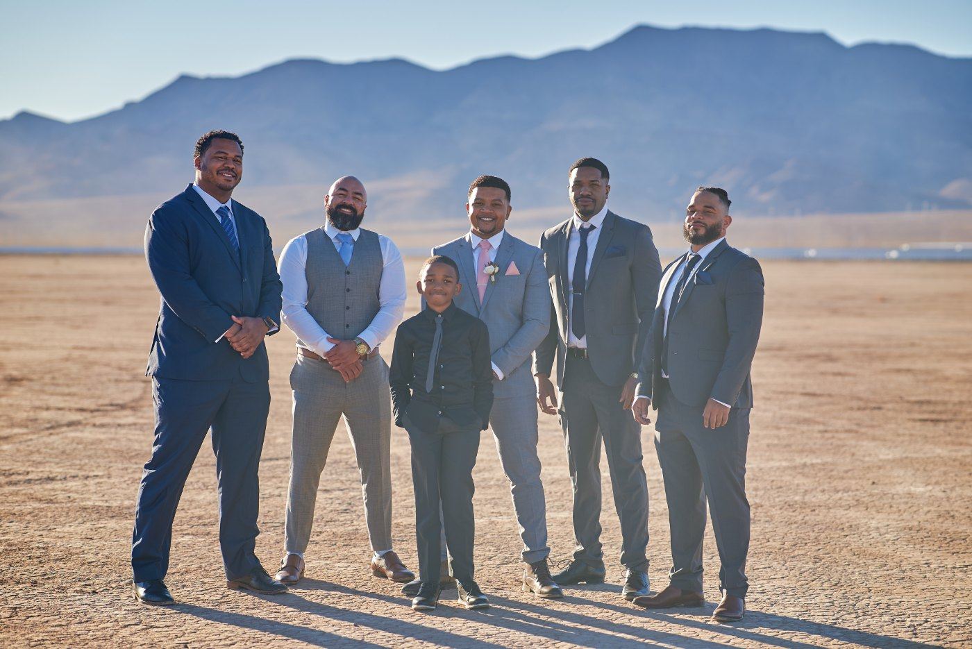 Las Vegas wedding photography — the groomsmen lined up across the lake bed