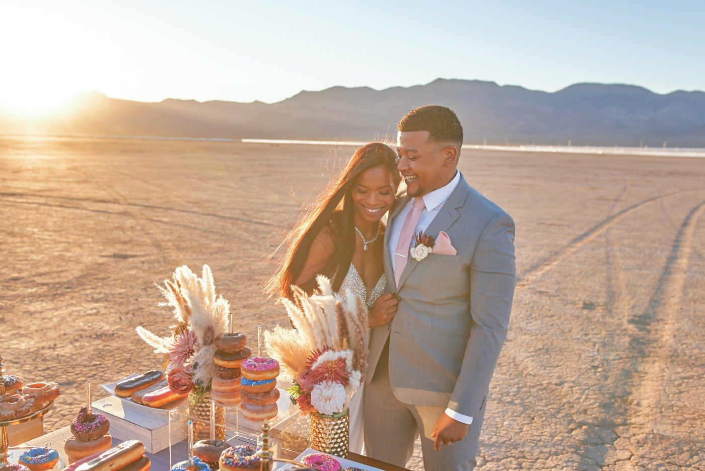 Las Vegas wedding photography — sunset light behind the dessert table