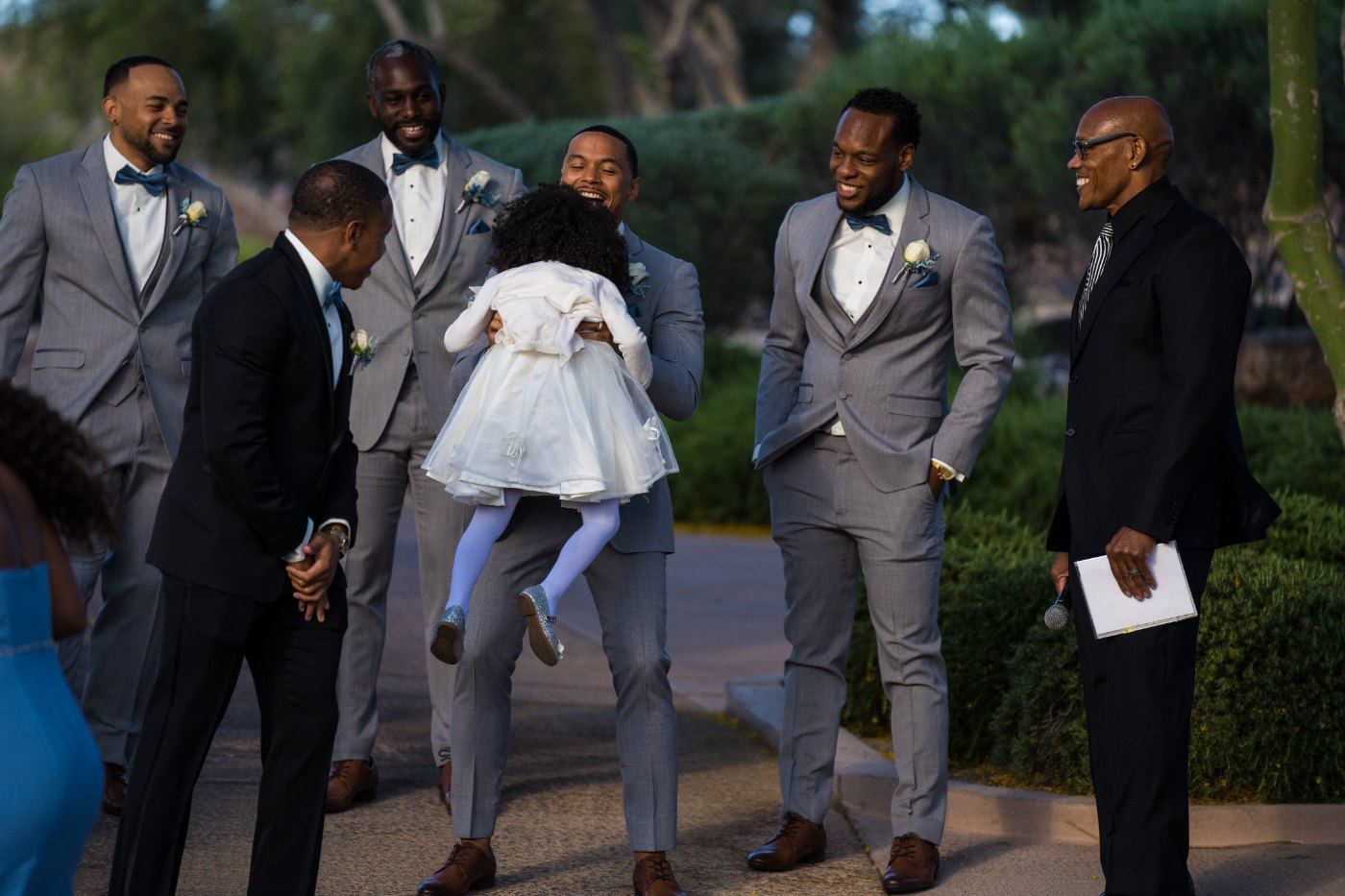 Las Vegas wedding photography — groomsmen in grey suits with the flower girl