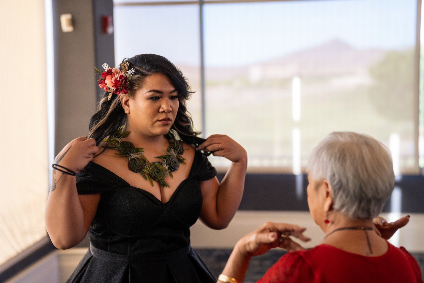 Las Vegas wedding photography — the bride having her flower lei adjusted before the ceremony