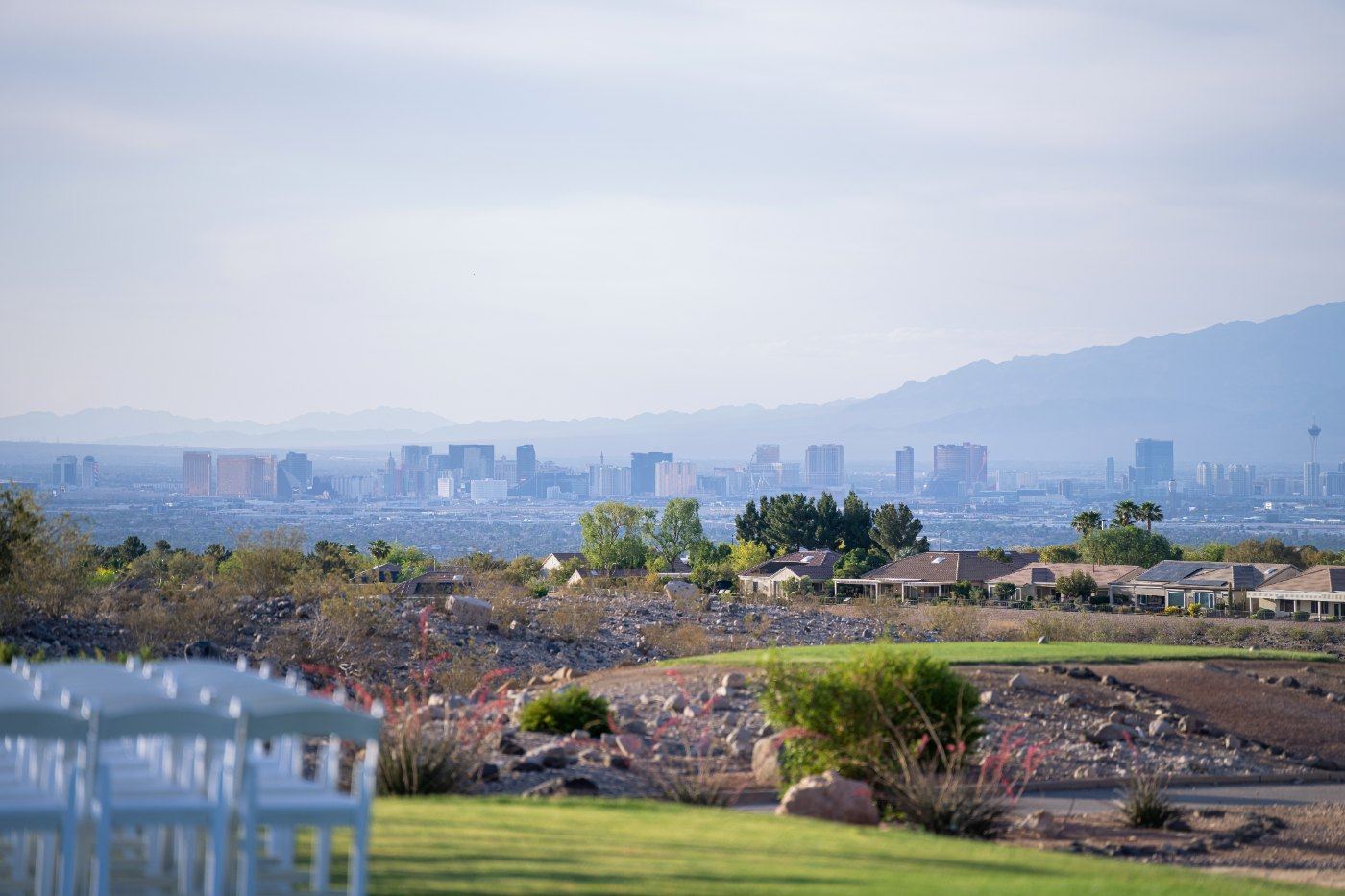 Las Vegas wedding photography — the ceremony set up on the fairway overlooking the Las Vegas skyline