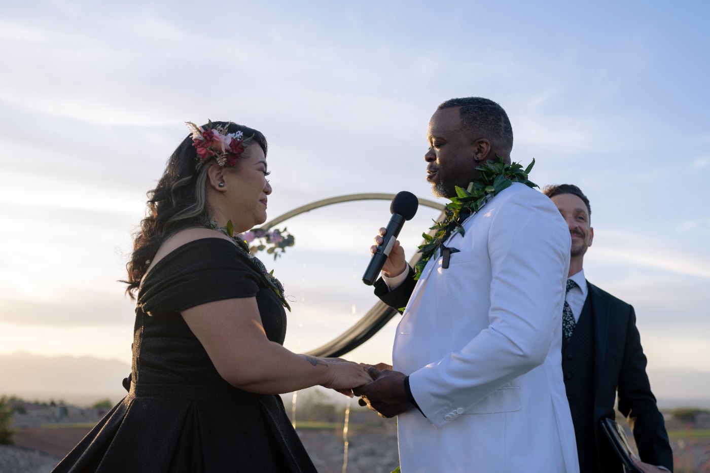 Las Vegas wedding photography — the couple exchanging vows at the microphone