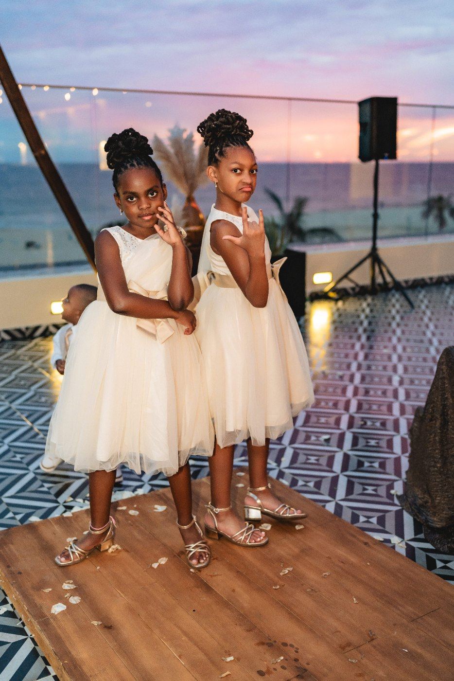 Las Vegas wedding photography — the flower girls at the reception as the sun goes down