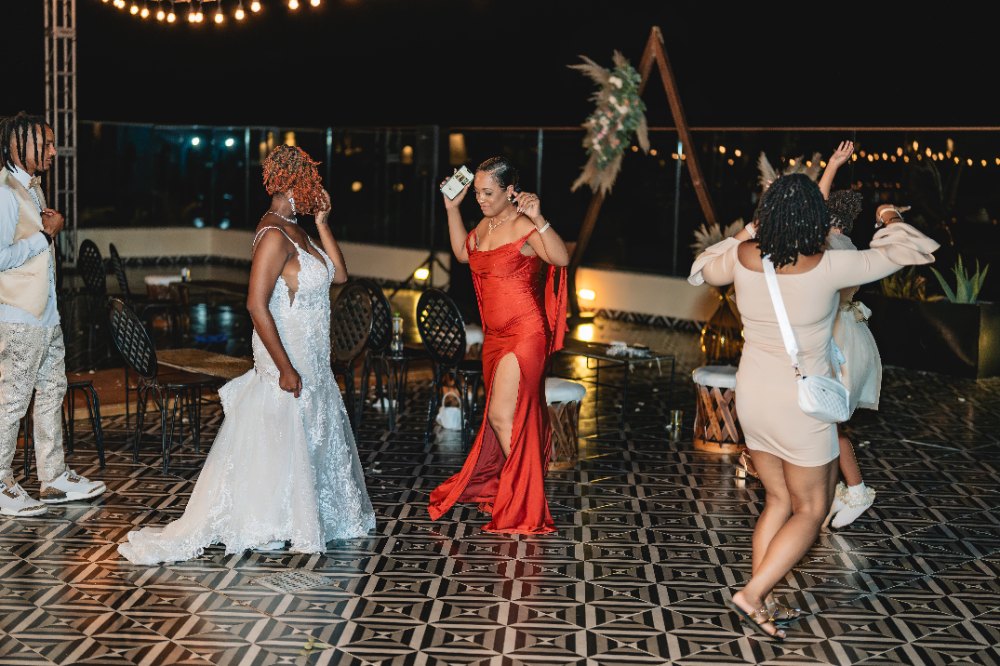 Las Vegas wedding photography — the rooftop first dance as the sunset turns pink