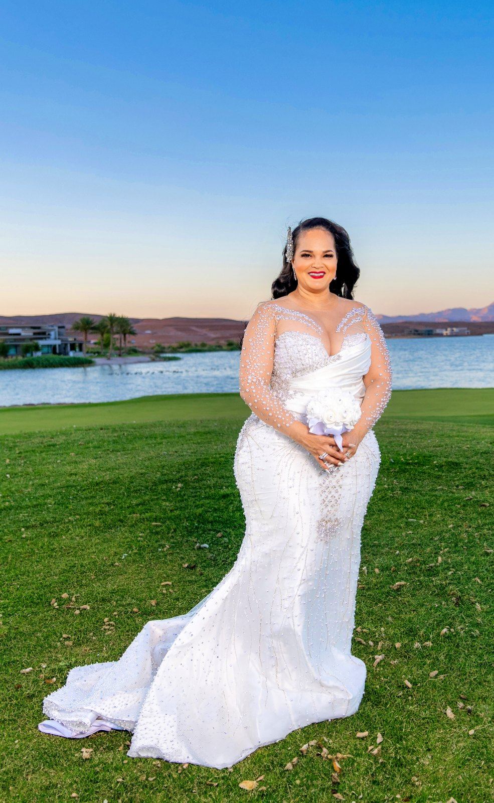 Las Vegas wedding photography — the bride on the lakeside lawn