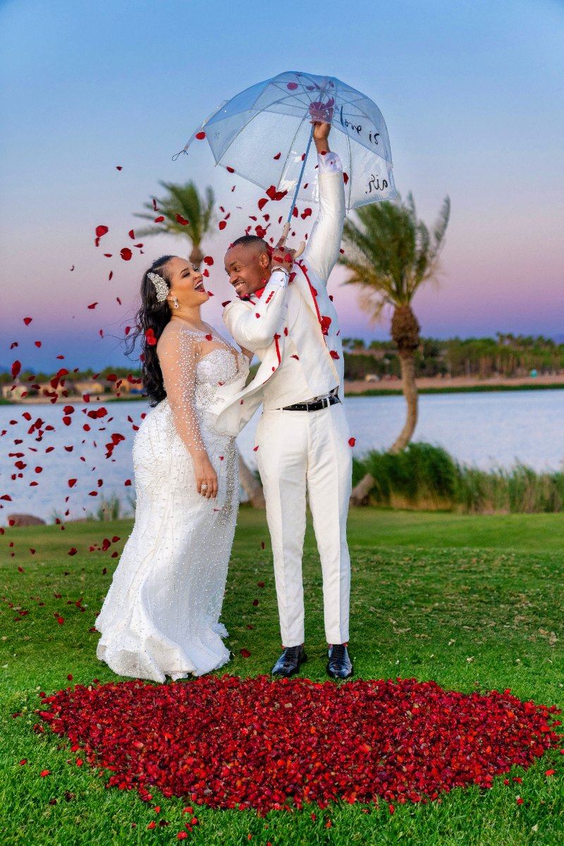 Las Vegas wedding photography — rose petals thrown in a heart shape under an umbrella