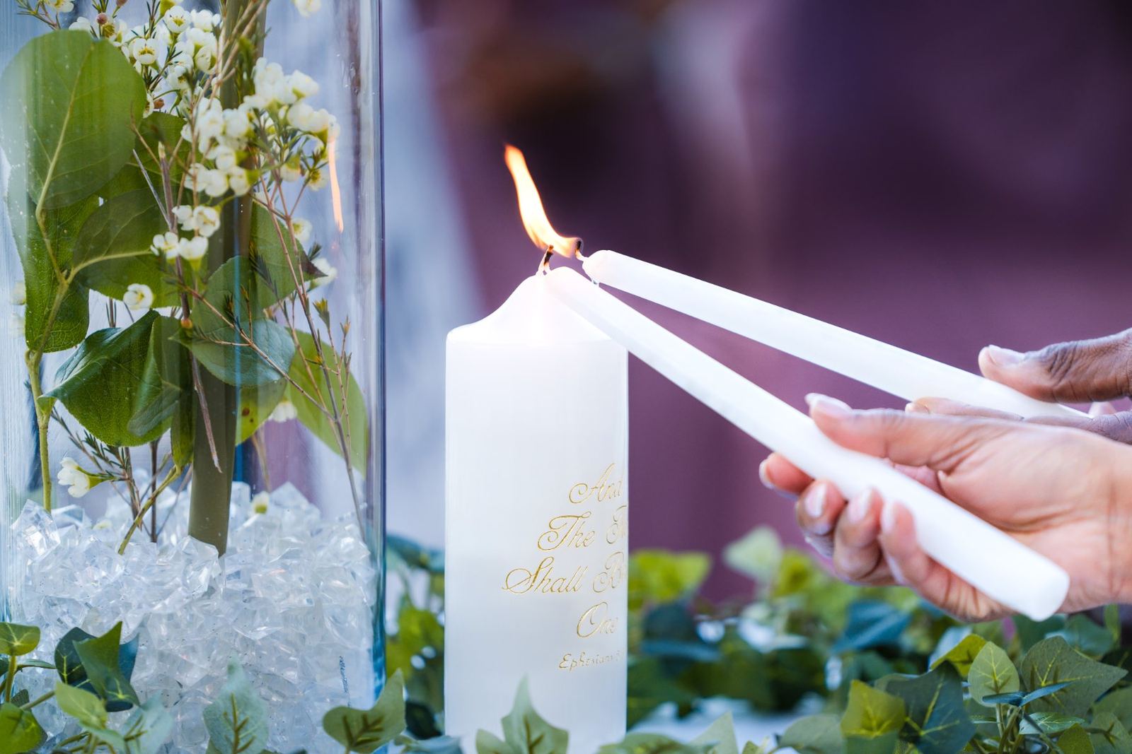 Las Vegas wedding photography — lighting the unity candle during the ceremony