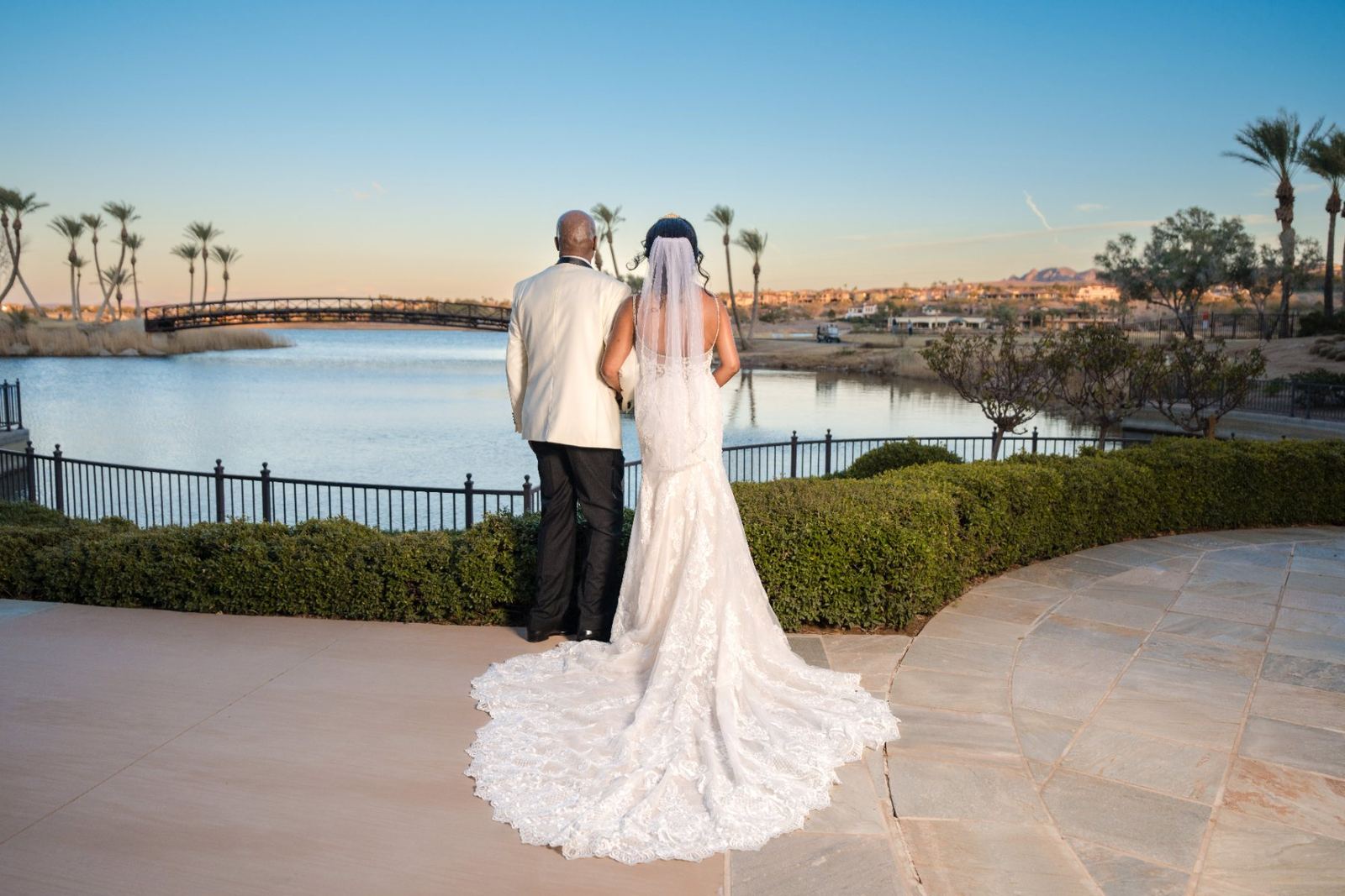 Las Vegas wedding photography — kiss by the lake at dusk