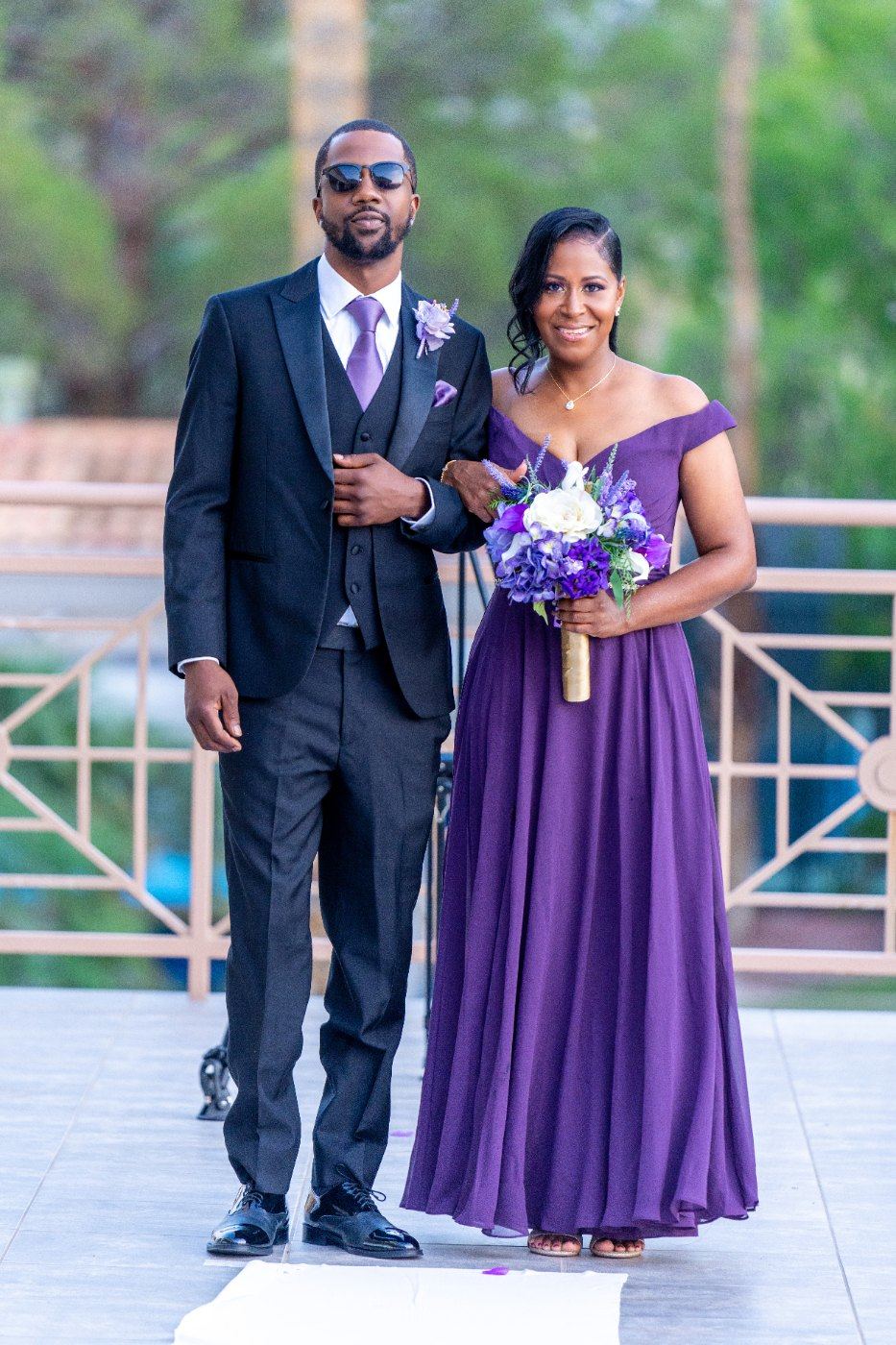Las Vegas wedding photography — a bridesmaid and groomsman walking in together