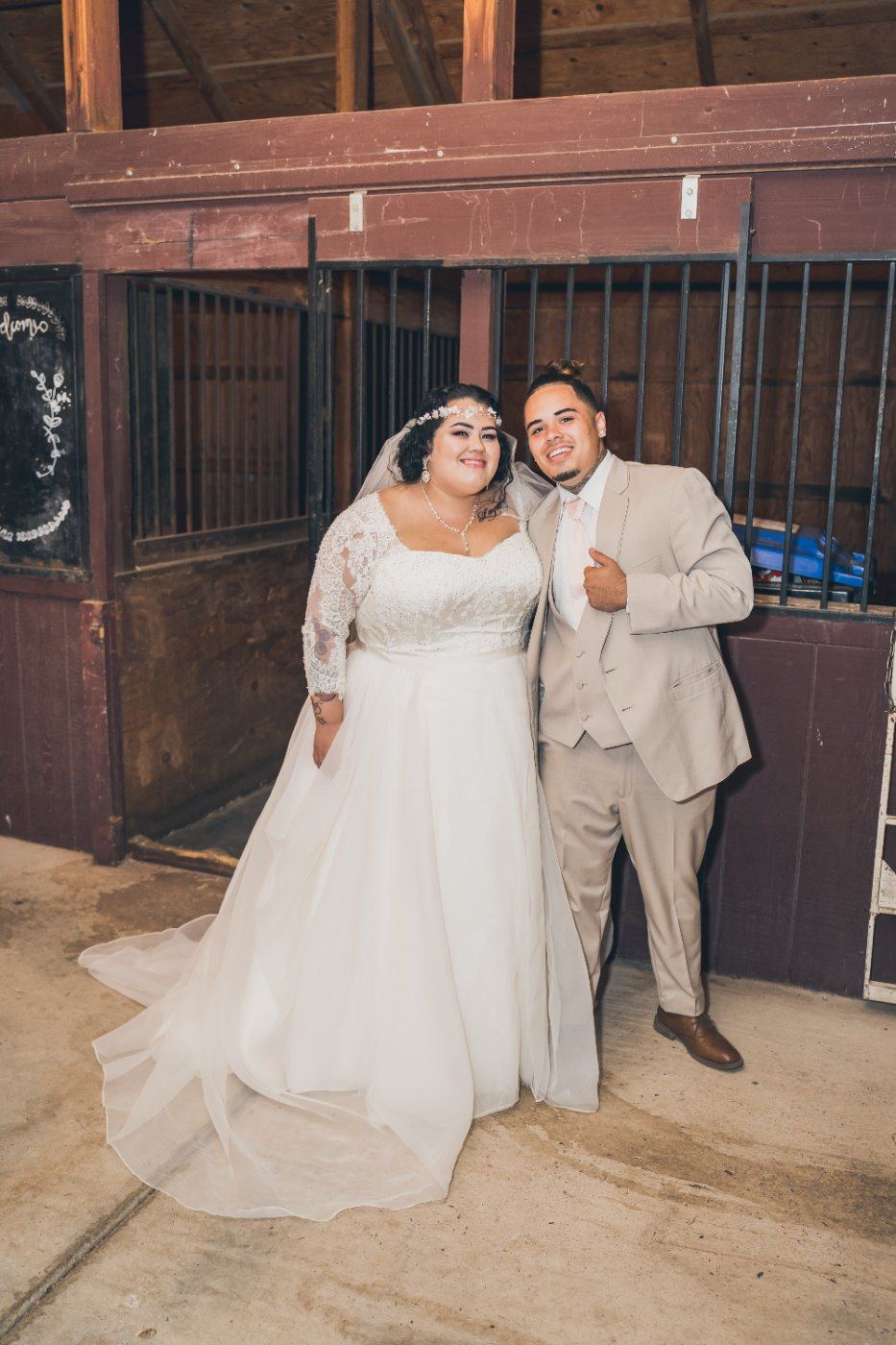 Las Vegas wedding photography — the couple standing together in the barn doorway
