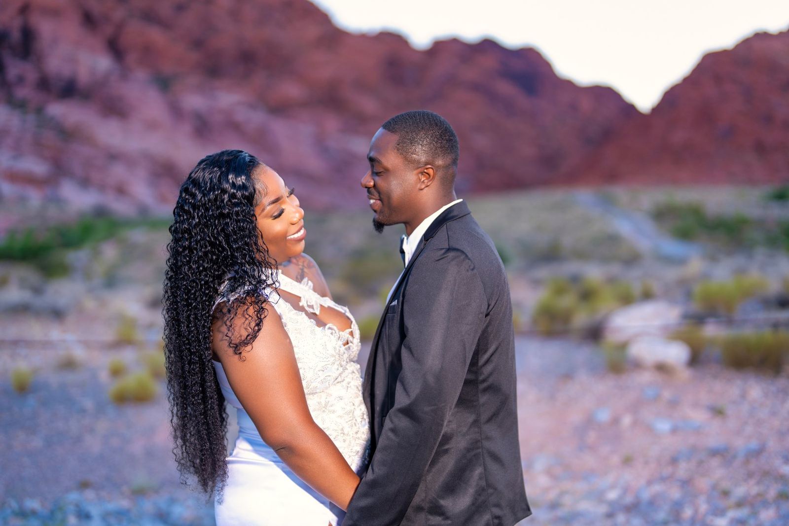 Las Vegas wedding photography — the couple laughing together at golden hour