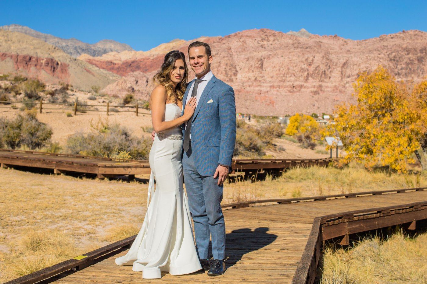 Las Vegas wedding photography — a portrait on the old tracks with red rock behind