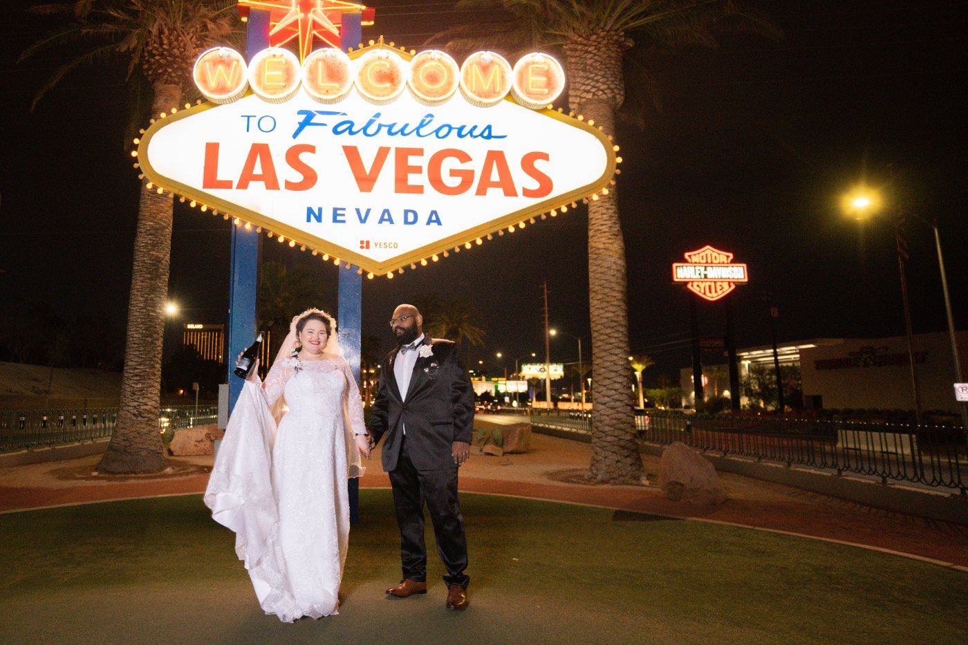 Las Vegas wedding photography — the couple at the Welcome to Fabulous Las Vegas sign