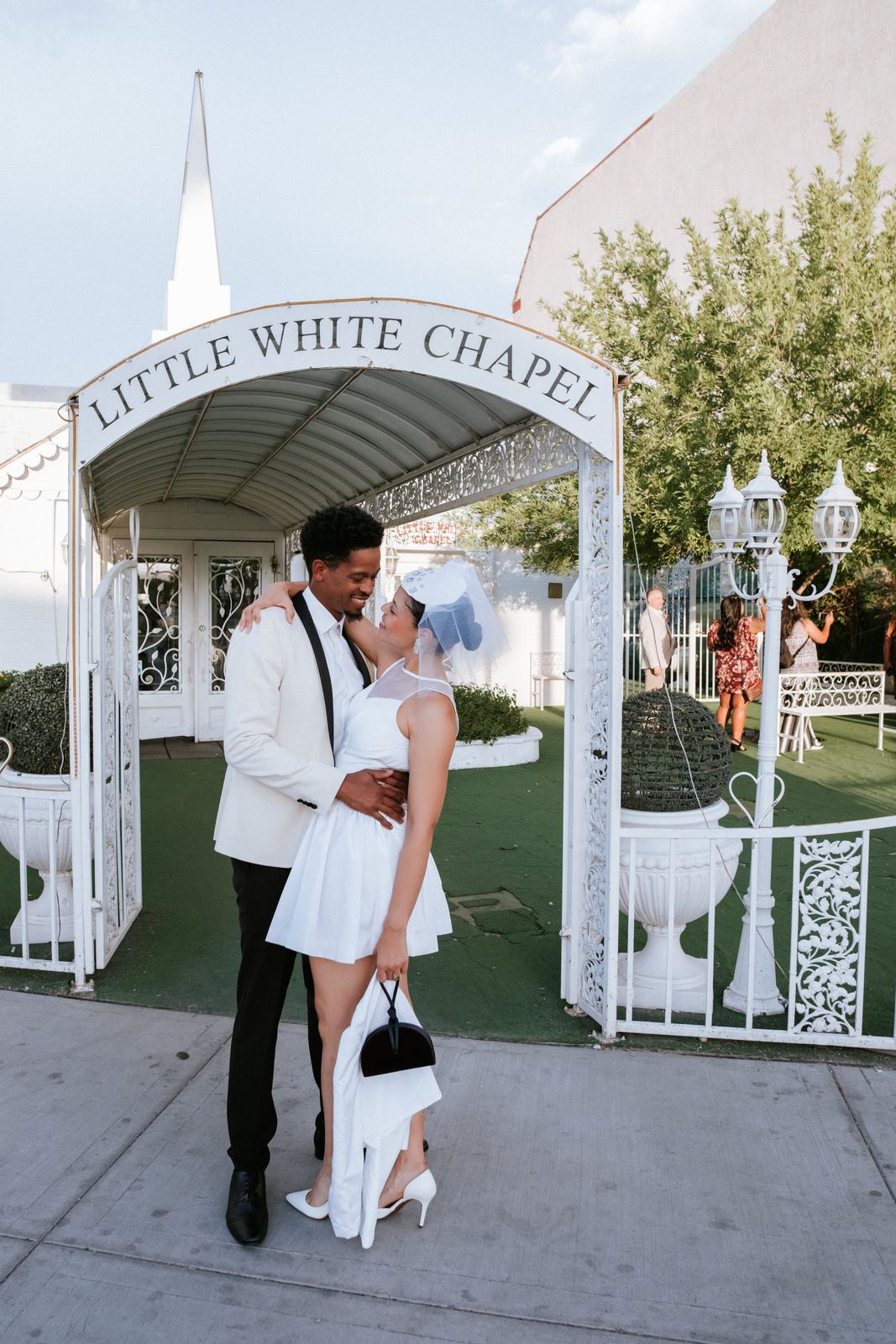 Las Vegas wedding photography — a kiss under the Little White Chapel sign