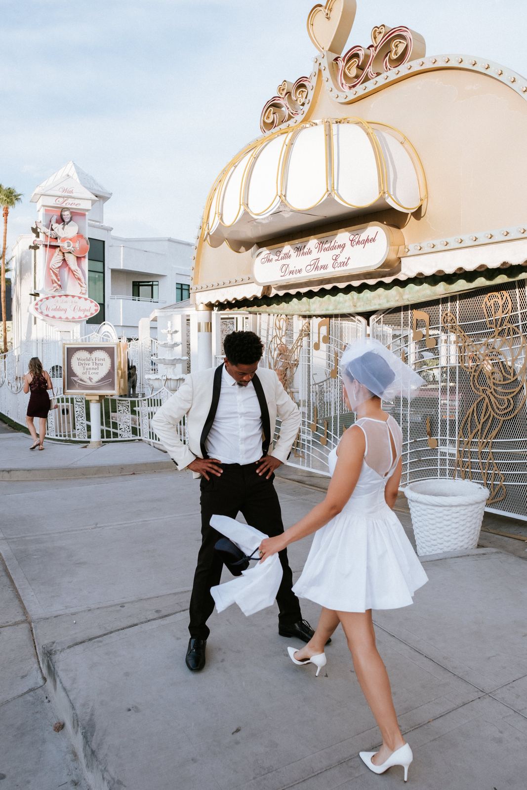 Las Vegas wedding photography — a piggyback lift outside the chapel