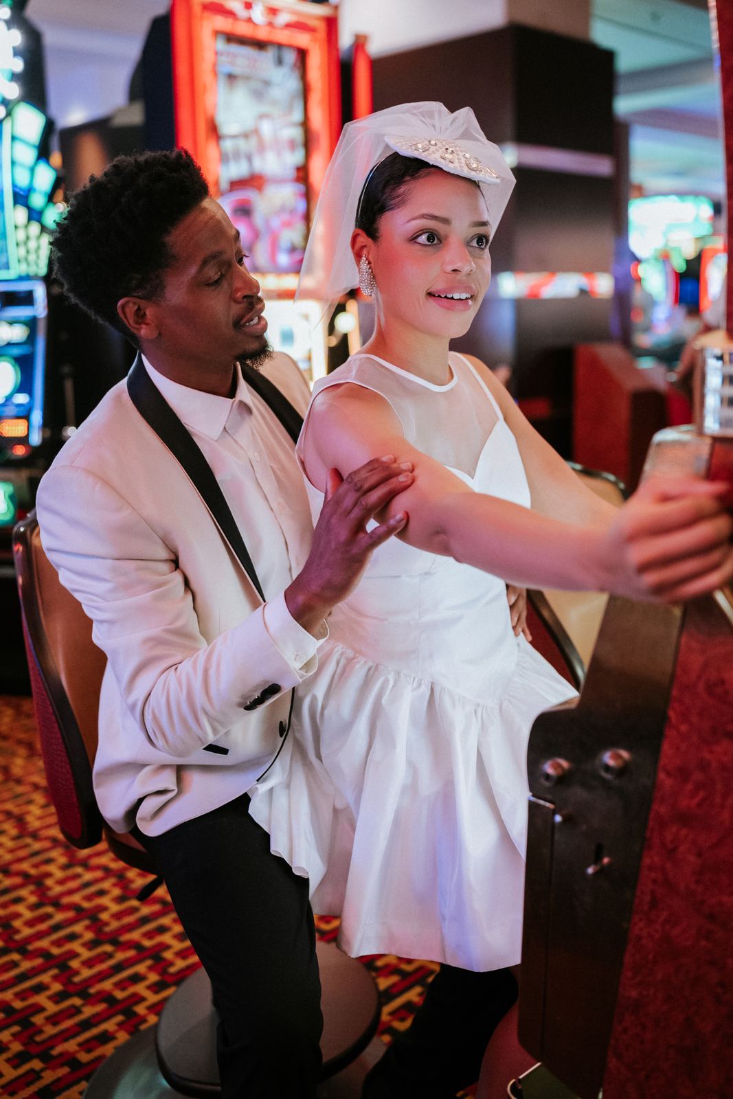 Las Vegas wedding photography — a playful moment under the casino lights
