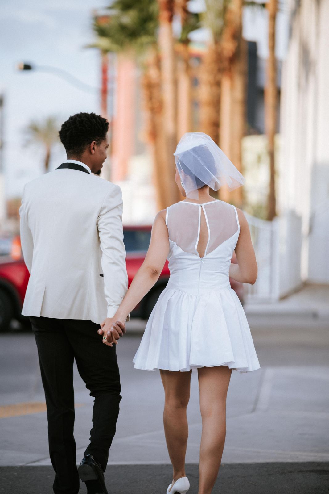 Las Vegas wedding photography — hand in hand down the sidewalk
