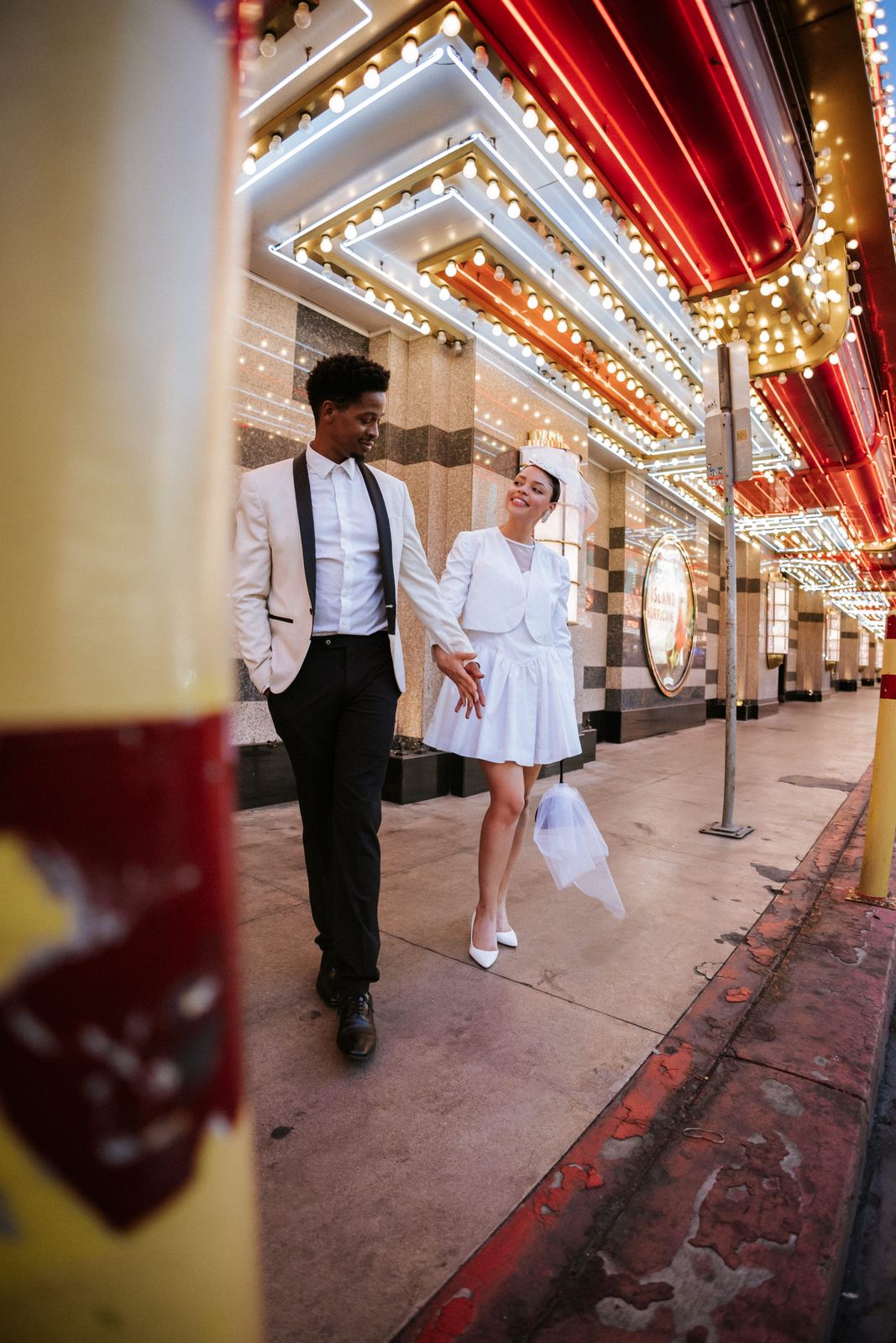 Las Vegas wedding photography — the walk down neon-lit Fremont Street