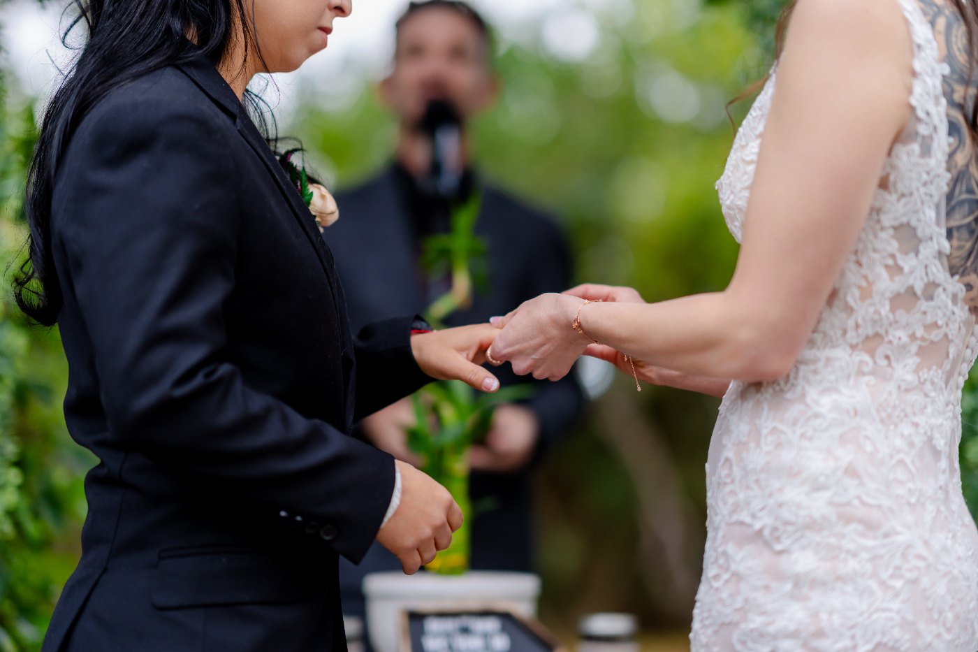 Las Vegas wedding photography — the ring exchange during the garden ceremony
