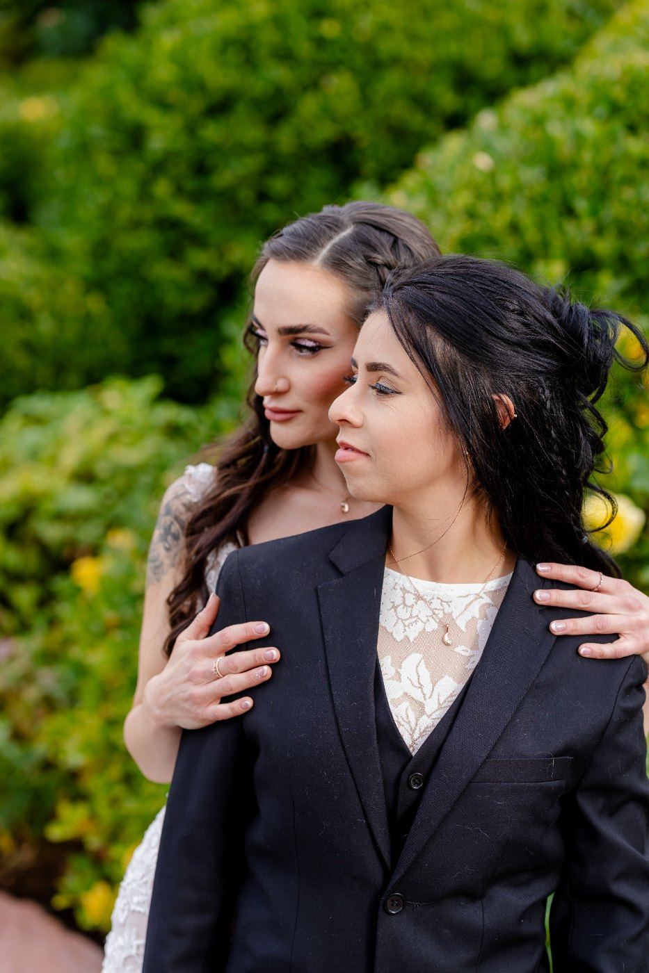 Las Vegas wedding photography — the two brides standing close together before the ceremony