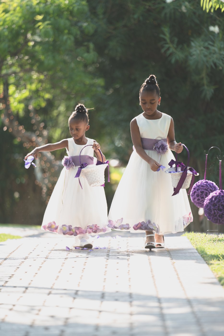 Las Vegas wedding photography — the flower girls walking the aisle together