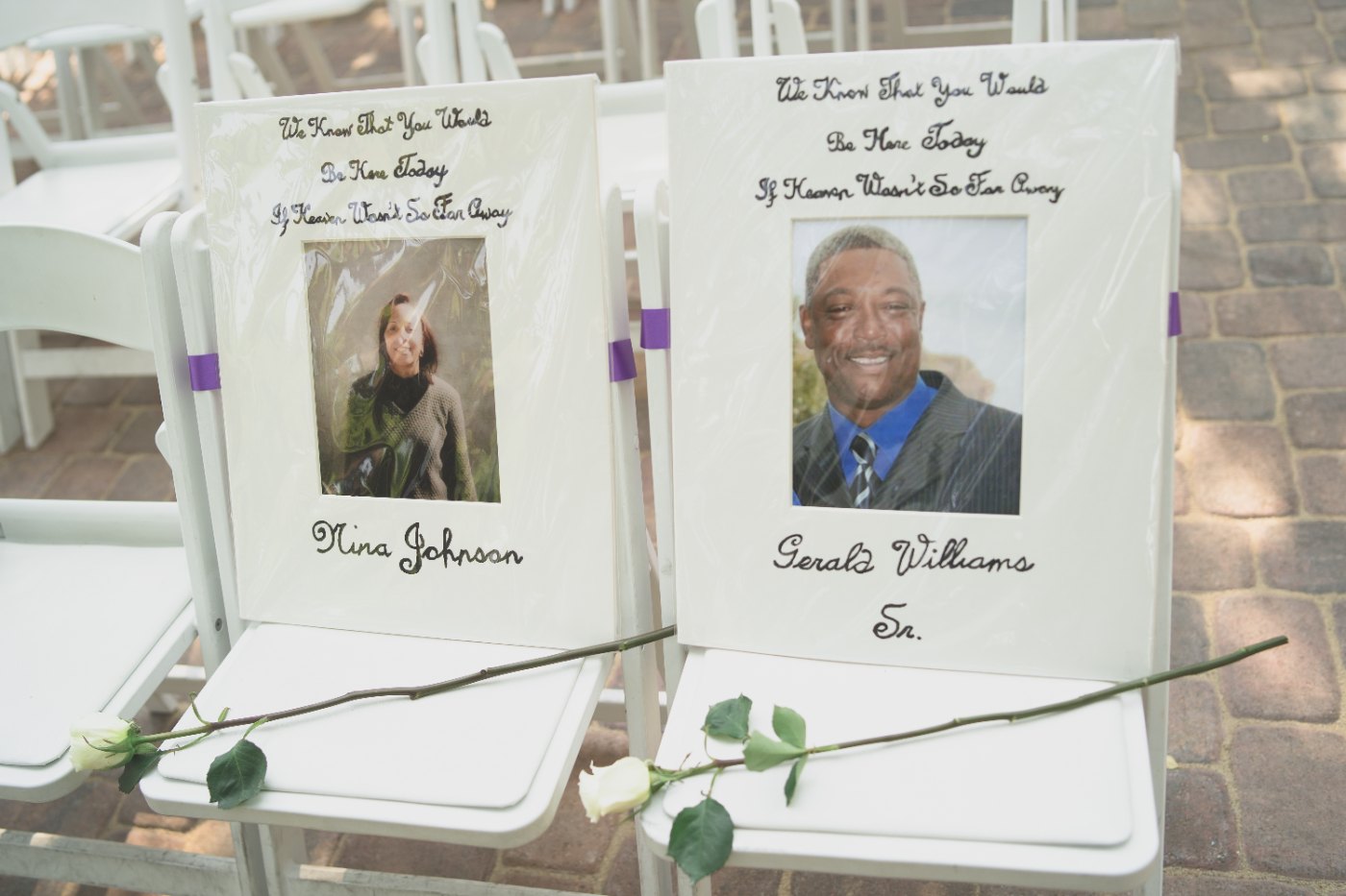 Las Vegas wedding photography — a memorial table set with framed portraits of loved ones