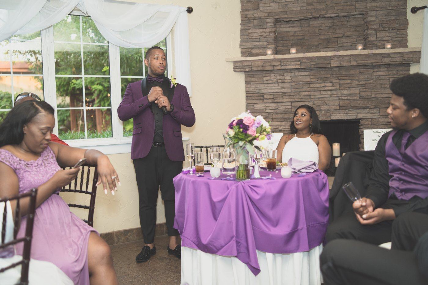 Las Vegas wedding photography — toasts being given at the sweetheart table
