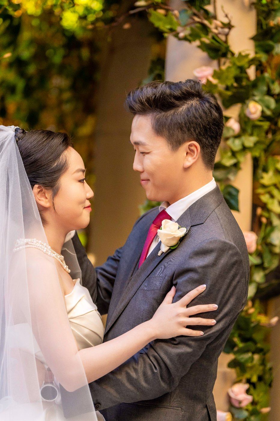 Las Vegas wedding photography — close portrait of the couple under the garden greenery