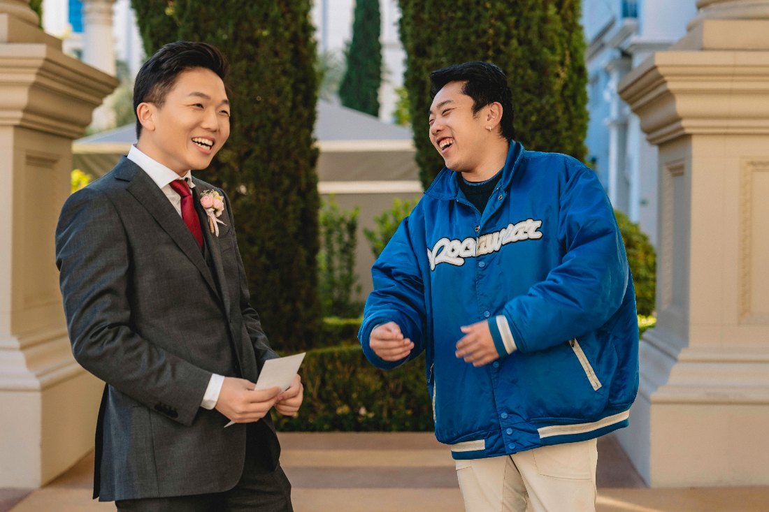 Las Vegas wedding photography — the groom laughing with a friend before the ceremony