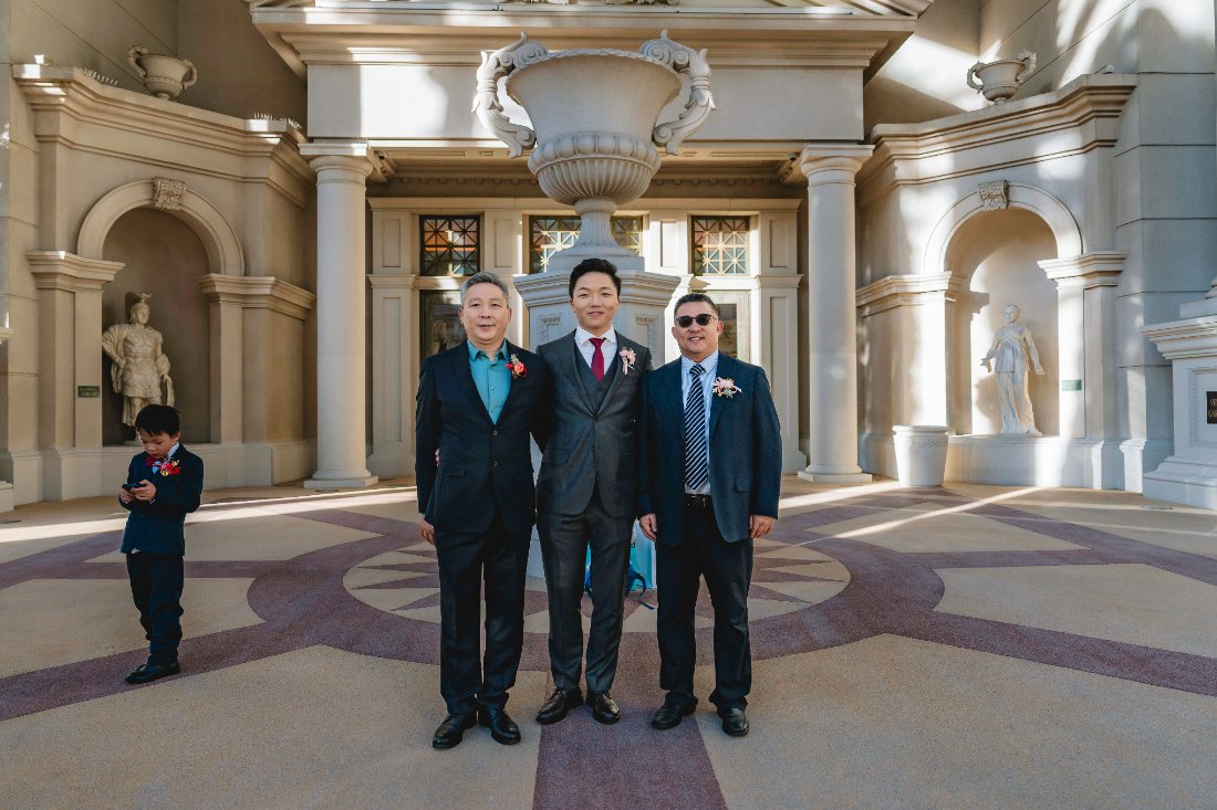 Las Vegas wedding photography — groomsmen posing for a group photo at Caesars Palace